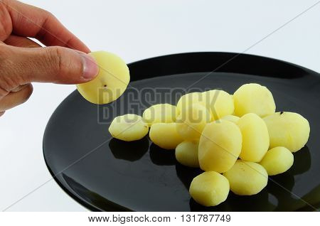 Close up peel water chestnut on black dish