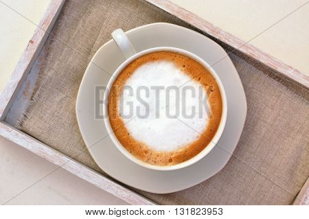 Cappuccino In The Cup On The Cloth