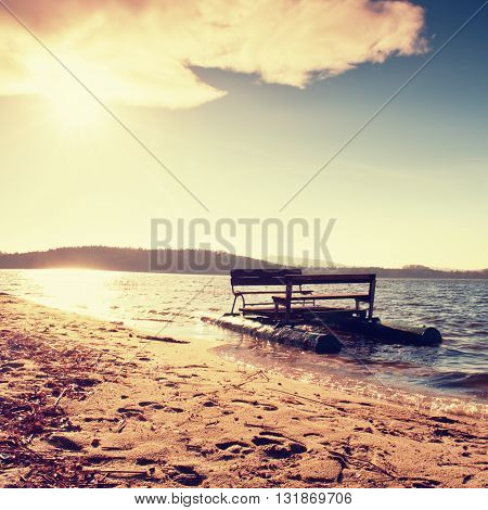 Abandoned Old Rusty Paddle Boat Stuck On Sand Of Beach. Wavy Level, Islad On Horizon. Autumn Weather