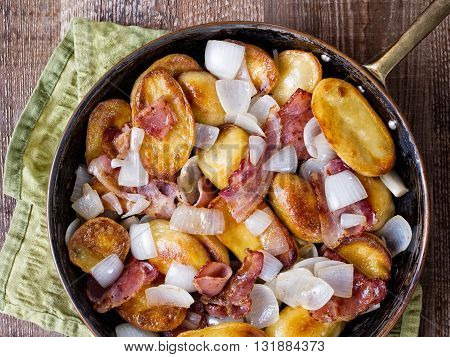close up of rustic german home fries bratkartoffeln