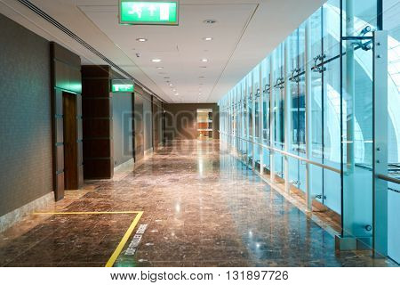 DUBAI, UAE - MARCH 09, 2016: inside of Dubai International Airport. Dubai International Airport is the primary airport serving Dubai, United Arab Emirates