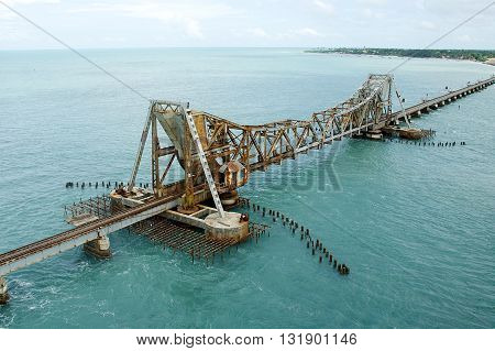 Pamban Railway Bridge near Rameshwaram in Tamil Nudu which can open up to allow ships to pass through below India Asia