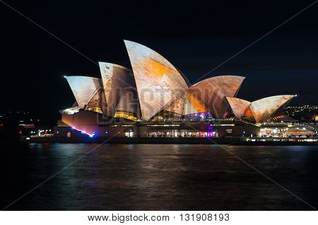Sydney Australia - 2016 May 27: Annual outdoor lighting festival Vivid Sydney: Festival of Light Music and Ideas. Sydney Opera House illumination Lighting the Sails Songlines. Long Exposure