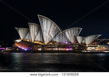 Sydney Australia - 2016 May 27: Annual outdoor lighting festival Vivid Sydney: Festival of Light Music and Ideas. Sydney Opera House illumination Lighting the Sails Songlines. Long Exposure