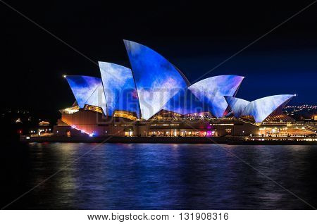 Sydney Australia - 2016 May 27: Sydney Opera House illumination Lighting the Sails Songlines during annual outdoor lighting festival Vivid Sydney: Festival of Light Music and Ideas. Long exposure