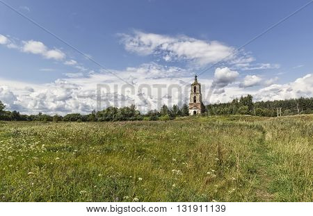 Ancient church in field the summer sunny day