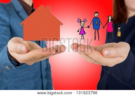 Family life insurance and proprety insurance protecting family family concepts.Man and woman hands making protection gesture.
