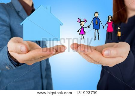 Family life insurance and proprety insurance protecting family family concepts.Man and woman hands making protection gesture.