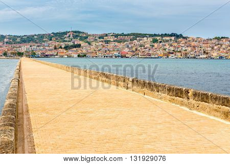Greek City Port Argostoli with yellow road on bridge