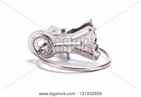 A metallic clamp for window Curtain is isolated on a white background