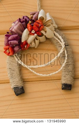 Lucky horseshoe on wooden background. Lucky horseshoe symbol for good luck.