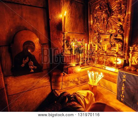 Jerusalem, Israel - February 17, 2013: Pilgrims  Praying Inside Aedicule In Church Of Holy Sepulchre