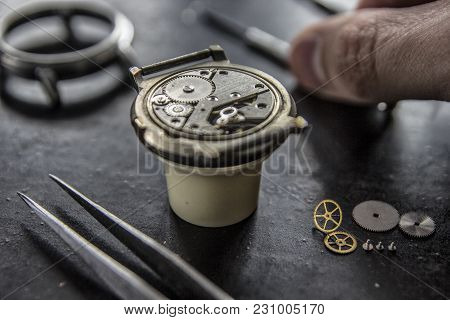 The Process Of Installing A Part On A Mechanical Watch, Watch Repair