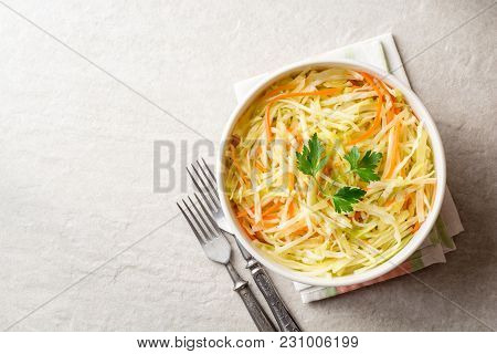 Fresh Coleslaw Salad In Bowl On Gray Stone Background.