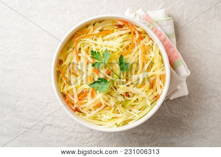 Fresh Coleslaw Salad In Bowl On Gray Stone Background.