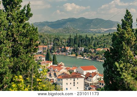 Inspirational Beautiful Landscape In Mediterranean Town With Sea, Coast And Valley. City In Green Va