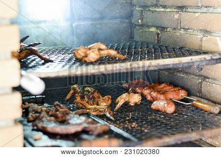 Brazilian Meat Grilling At A Churrasco On A Churrasqueira