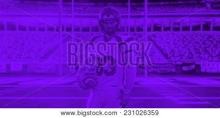 duo toned american football player in  arena at night with stadium lights