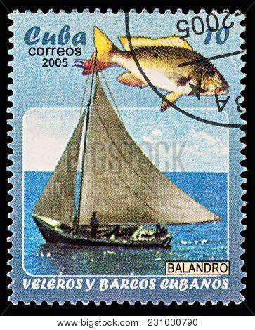 Moscow, Russia - March 12, 2018: A Stamp Printed In Cuba Shows Yacht And Fish, Series 