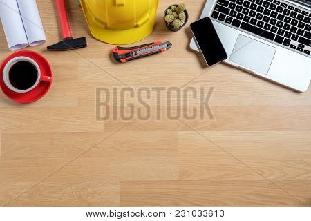 Office Desk With Smart Phone,computer, Cup Of Coffee And Engineer Equipment.top View With Copy Space