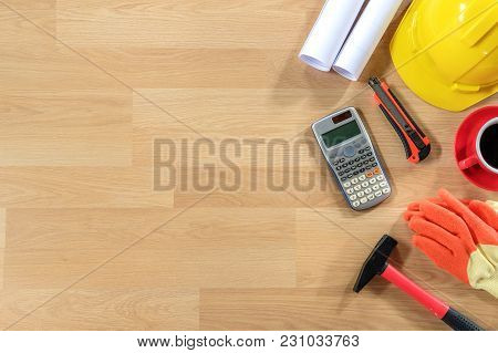 Office Desk With Calculator, Cup Of Coffee And Engineer Equipment.top View With Copy Space. Backgrou