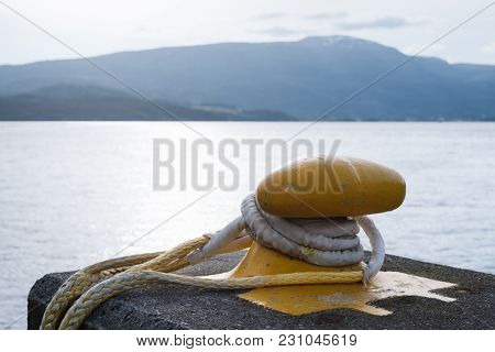Sunny Norwegian landscape. Berth in Norway. Bitt Close up