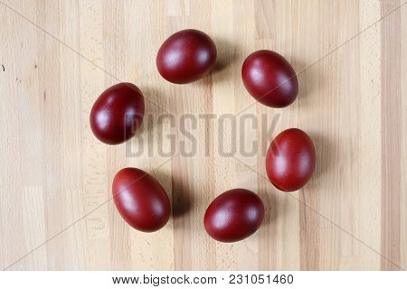 Red Colorful Easter Eggs On Wooden Background
