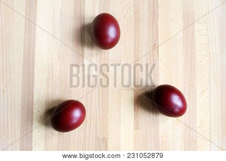 Red Colorful Easter Eggs On Wooden Background