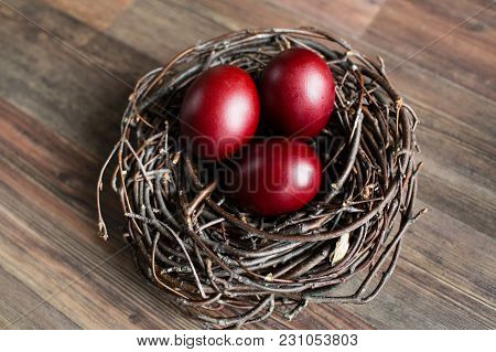 Easter Egg In The Nest On Grey Background