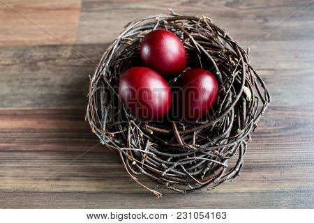 Easter Egg In The Nest On Grey Background