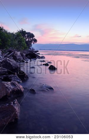 Sunrise On Riverbank