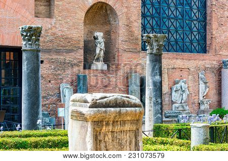 Rome, Italy - April 14, 2017: View Of Ruins Of The Baths Of Diocletian With Statues And Columns  Fro