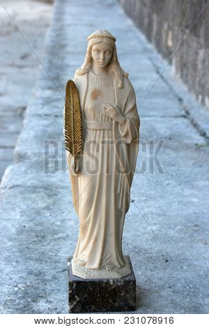 BLATO, CROATIA - MARCH 22: Saint Vincenca statue, Church of All Saints in Blato, Korcula island, Croatia, on March 22, 2017.