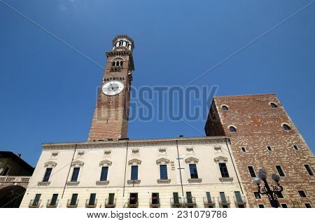 VERONA, ITALY - MAY 27: Torre dei Lamberti - medieval tower of the Lamberti XI century - 84 m. Piazza delle Erbe, UNESCO world heritage site  in Verona, Italy, on May 27, 2017.