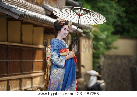 Kyoto, Japan - June 10: Unidentified Woman Dress Like A Maiko, Japanese Women Usually Makeup As Geis