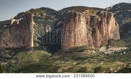 Entire Riglos Mallets And Town With -el Puro-
