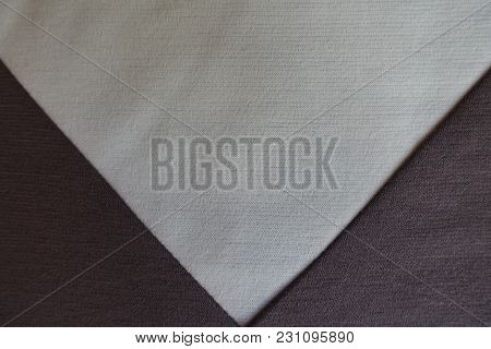 Cream Triangular Gusset Sewn To Brown Fabric