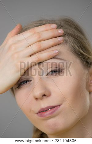 Young Blonde Woman Having Serious Migrene Suffering From Horrible Head Ache Feeling Big Pain.