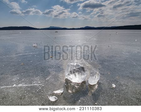 Big Piece Of Ice With Abstract Cracks Inside. Icicle Block Indetail With Frozen Bubbles And Rich Str