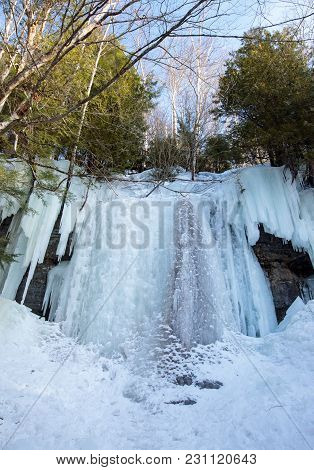Ice Caves And Ice Curtains Form Along The Pictured Rocks Escarpment On Sand Point Road In Munising M