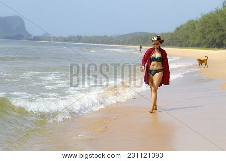 Woman Pretty And Bikini Relax Daylight On Beach At Bang Beot Beach, Chumphon Province Thailand