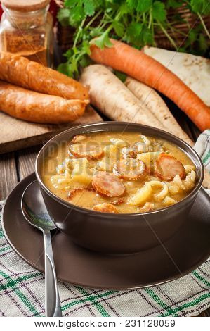 Traditional Polish Split Pea Soup With Sausage, Bacon And Potatoes