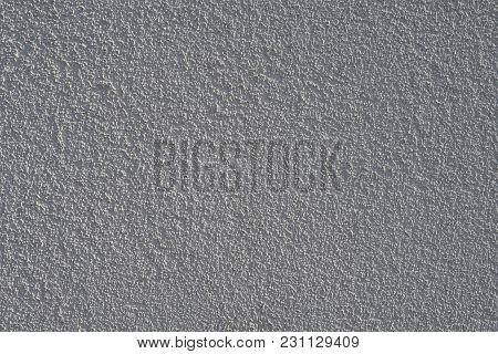 The Background Of Light Walls With Raised Plaster.