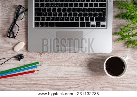 Notebook With Hot Coffee On Wood Table