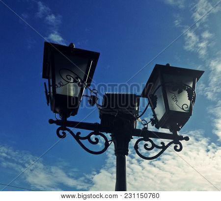 Street Lamp, City And Blue Sky With Clouds. Detail Fro Small Town In Serbia, Irig. Vintage Retro Lam