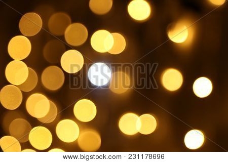 Golden Abstract Bokeh Lights. Defocused Background.bokeh Lights. Beautiful Christmas Background.luxu