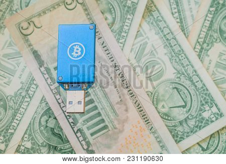 Blue Thumb Drive Usb Bitcoin Miner On Top Of Stack Of American Money