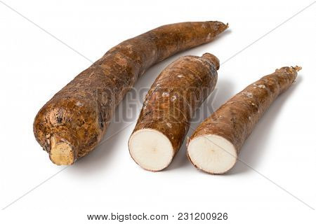 Whole Cassava root and two parts isolated at  white background