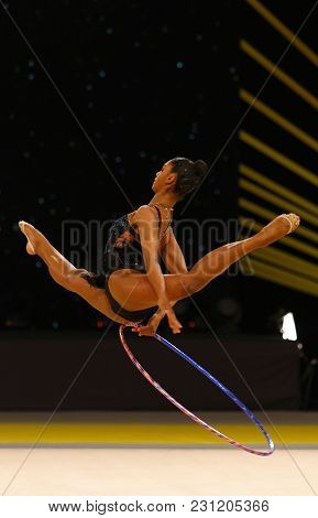 Kyiv, Ukraine - March 18, 2017: Rhythmic Gymnast Nastasya Generalova Of Usa Performs With Hoop Durin