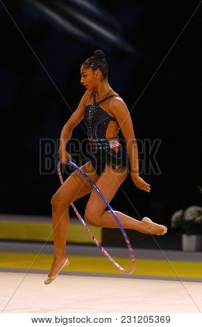Kyiv, Ukraine - March 18, 2017: Rhythmic Gymnast Nastasya Generalova Of Usa Performs With Hoop Durin